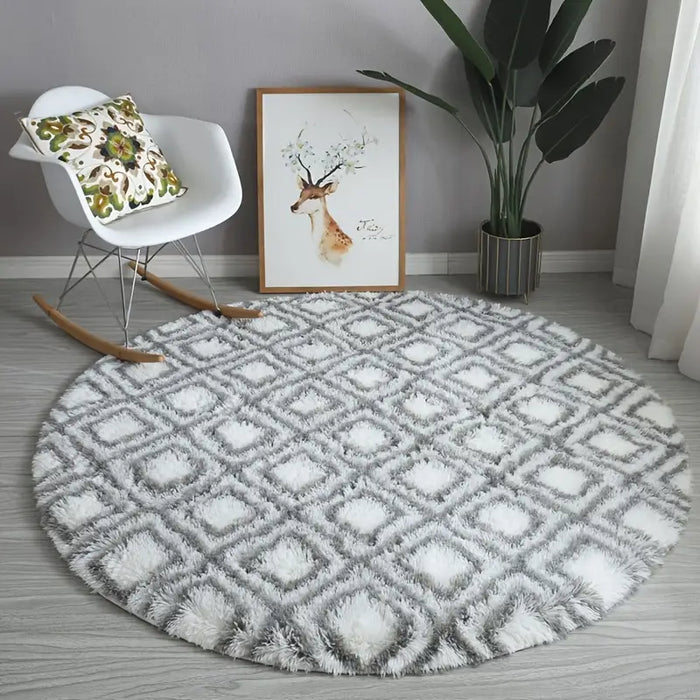 Round grey and white shaggy area rug with geometric diamond pattern and high-pile plush texture for modern living room decor.